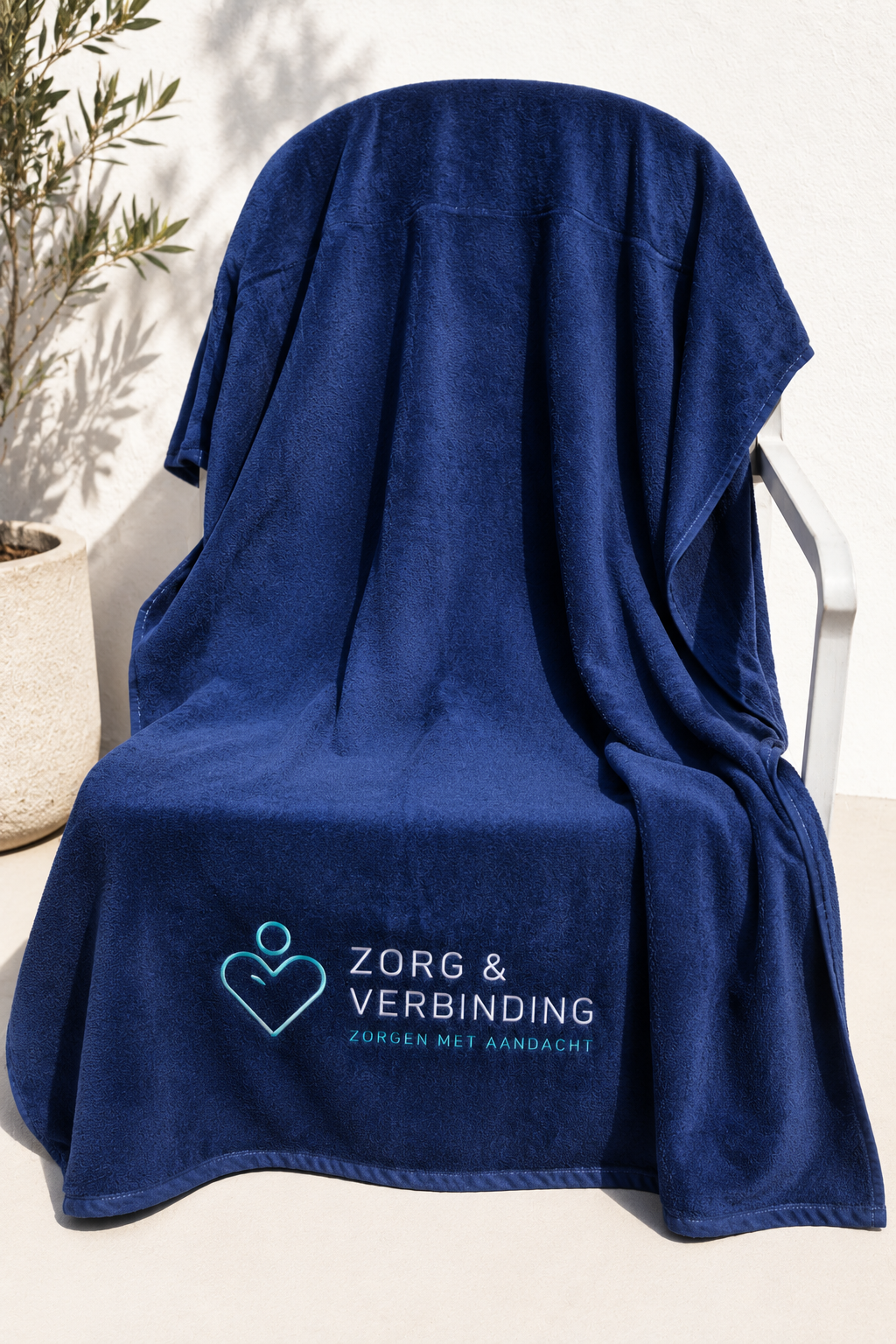 Geborduurd strandlaken velours